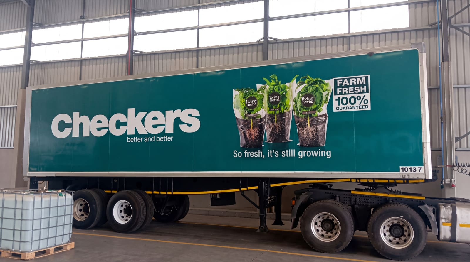 Large-format trailer graphics for Checkers Living Herbs, farm fresh produce